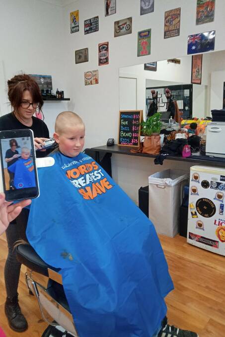 Ten-year-old Shaun Wilding's beloved mullet has been shaved off in the name of helping people who are facing cancer. 