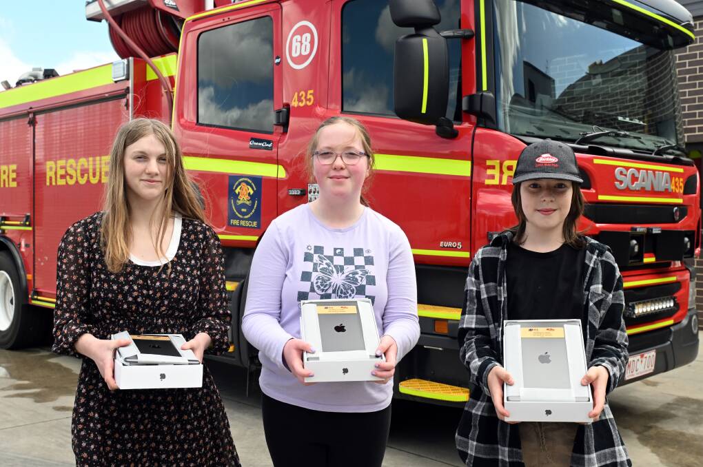 Community organisations, such as Lucas' fire fighters, have been rally behind charity Keely's Cause, which delivers iPads to support neurodiverse children in the region. Picture by Kate Healy