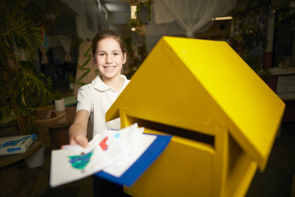 BRIGHT NOTE: Emmaus pupil Ailish Ryan has created a Sunshine Letters campaign to send caring notes to Ballarat's homeless. Picture: Luka Kauzlaric