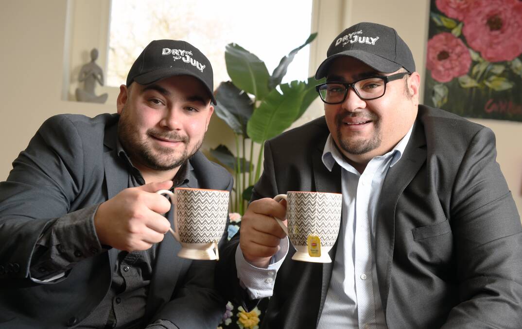 NEW THIRST: Lateral Plains chief executive officer Luke Fong and chief operating officer Tevita Topui are fighting cancer with cups of tea this month. Picture: Kate Healy