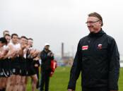 FAREWELL: North Ballarat Roosters players and staff form a guard of honour for decorated coach Gerard FitzGerald in his final match as a Victorian Football League coach in 2015. Picture: Kate Healy