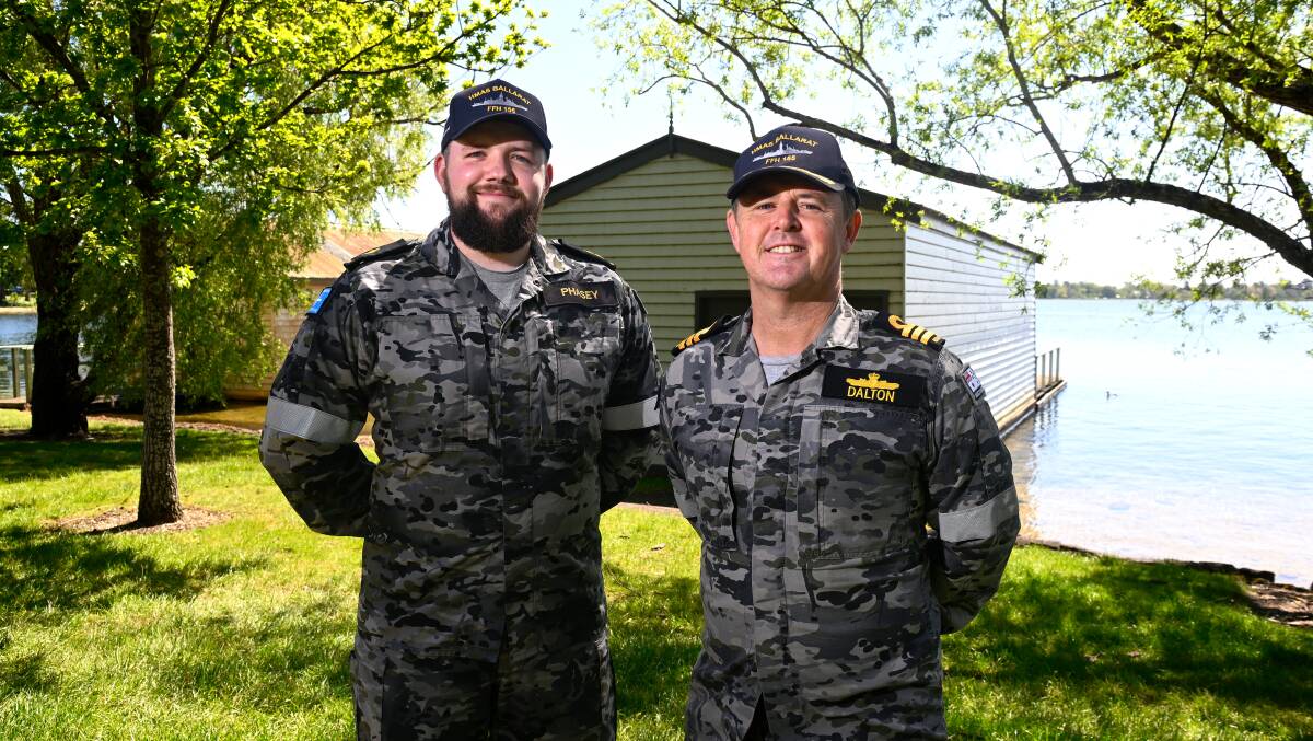 Able seaman Angus Phasey with his commanding officer Commander Ben Dalton at Lake Wendouree where Phasey has great memories of Boat Race and Lap of the Lake. Picture by Adam Trafford
