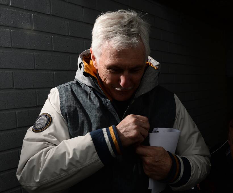 BACK HOME: Michael Malthouse warms up in the Eureka Stadium players' race before a VFL game last season. He has remained a strong support for his old club and developing the game in Ballarat. Picture: Adam Trafford.