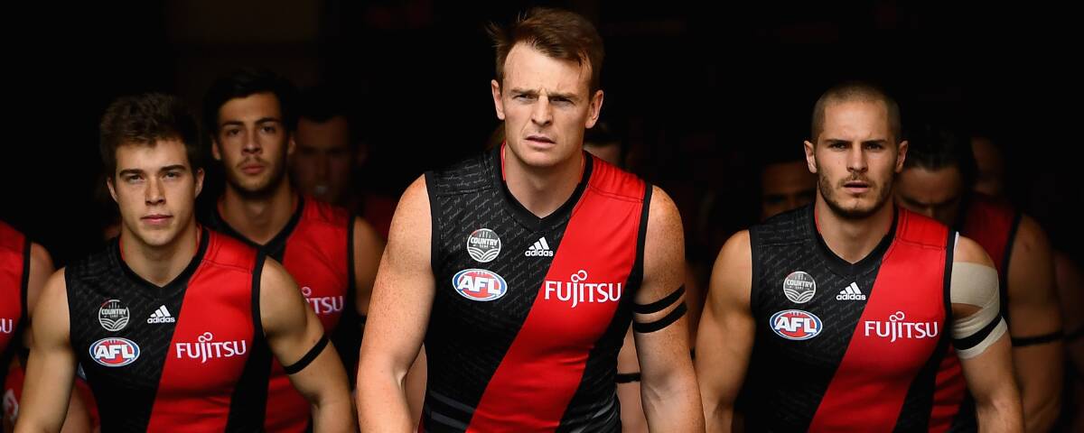 DONNING PRIDE: Brendon Goddard has the honour of leading a pieced-together Essendon into action on Anzac Day in a game of solemn respect. Picture: Getty Images