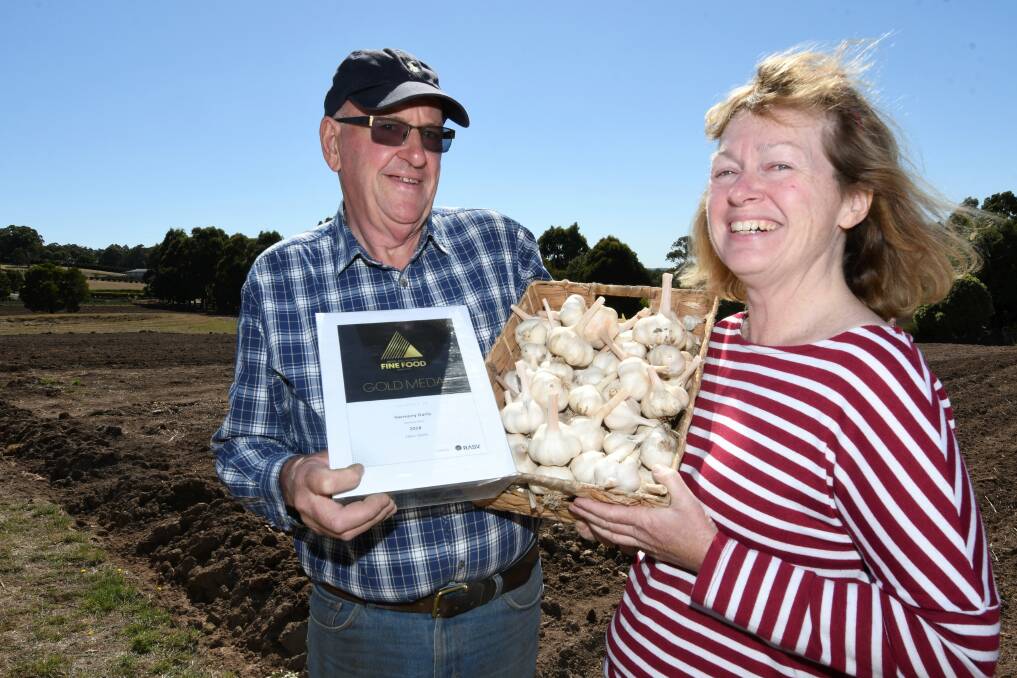 ADVOCATES: Harmony Garlic's Brian and Helen Woodstock celebrate their award-winning produce, saying it is validation for the work they put into natural crops on their Gordon farm. Picture: Lachlan Bence