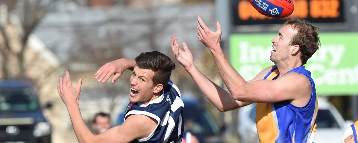 EMERGING: Roosters-listed ruckman Rowan Marshall (left) made an impact as a ruck-forward for the Burras in his debut Ballarat Football League season last year.