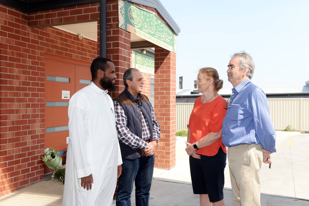 Ballarat imam Abdulkhalk Ismael and Ballarat Islamic Society member Ahmed Nageeb welcome support from Julie McMahon and Graeme McLaughlan. Picture: Kate Healy