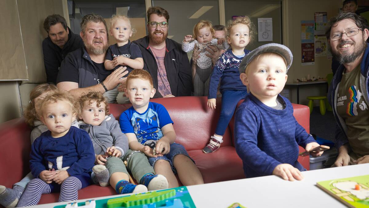 ENGAGE: Some of the children and their dads in the Sebastopol playgroup last year. Picture: Luka Kauzlaric
