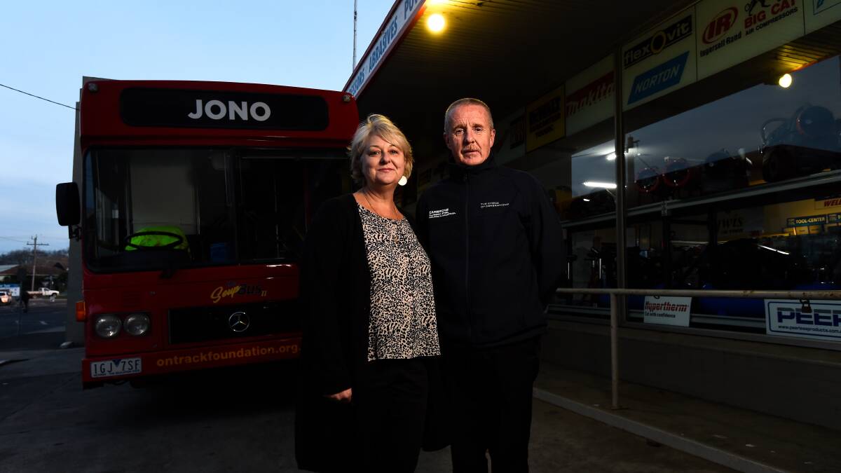 HELP: Jenni Crowden, mother of Jonathan who this soup bus is named after, and volunteer driver Michael Quick at the Camerons' Armstrong Street site. Picture: Adam Trafford