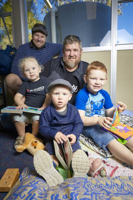 SUPPORT: Dads Ash Callander and Leigh Whitten with Tori (aged 2), Tyler (19 months) and Jaxon (4) hang out in the new Me and My Dad play space at Sebastopol Primary School. Picture: Luka Kauzlaric