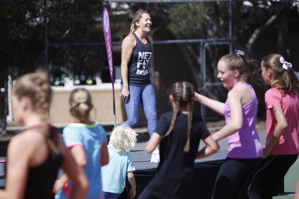 FUN: NETFIT creator Sarah Wall, pictured leading a junior fitness class in Ballarat, is teaming with Netball Australia for a free online program during coronavirus lockdowns.
Picture: Luka Kauzlaric