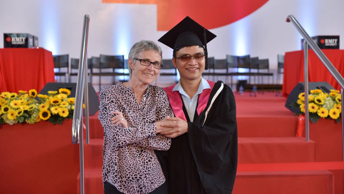 Sister Trish Franklin with Nguyen Thanh Vinh at RMIT University Vietnam's graduation ceremony. Picture: RMIT Vietnam