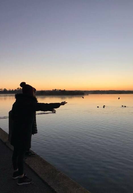 EFFECTS: Casting pebbles into Lake Wendouree to symbolise the ripples of every suicide. Picture: Ballarat and District Suicide Prevention Network