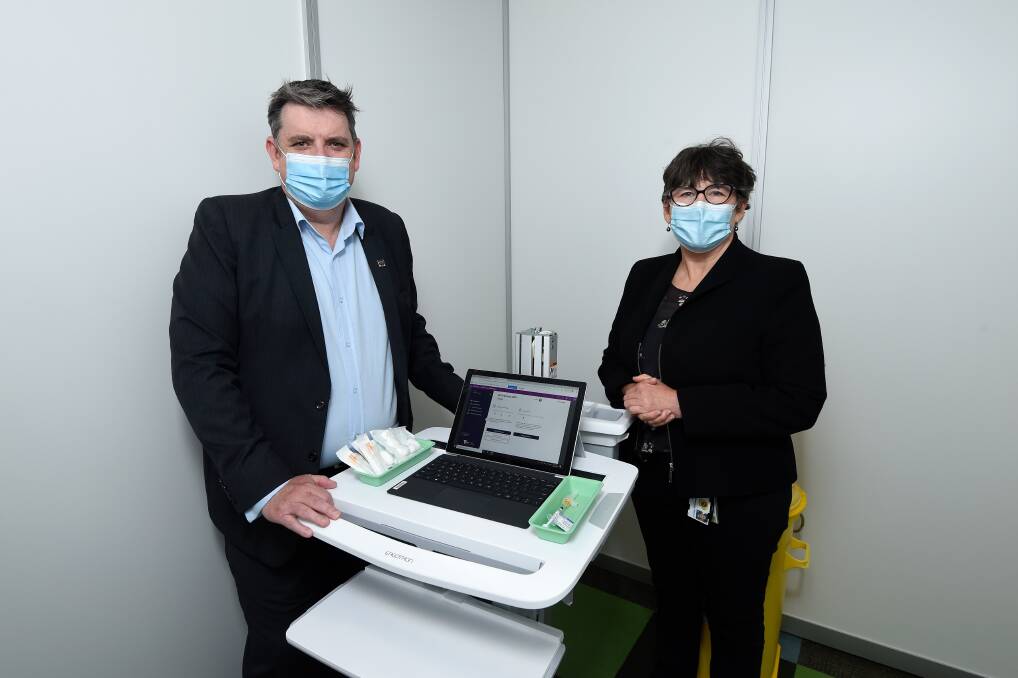READY: Ballarat Health Services chief Dale Fraser and Grampians Public Health Unit clinical director Rosemary Aldrich in the BHS Base Hospital staff vaccination centre. Picture: Adam Trafford