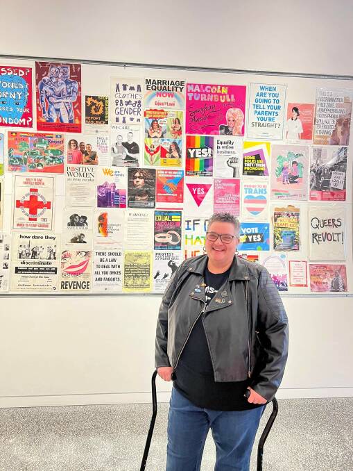 RECOVERY: KL Joy is finally mobile enough to visit Protest in Posters exhibition at the Victorian Pride Centre, St Kilda. Picture: Rebecca McLean Photography