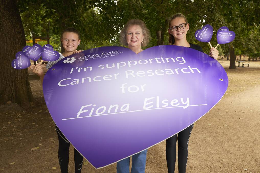 HEARTFELT: Gail Elsey with Fiona's nieces Charlotte and Sarah Elsey, who proudly compete each year in hope for a cure to cancer. Participants are asked to declare, in their heart, who they ride for this year. Picture: Luka Kauzlaric