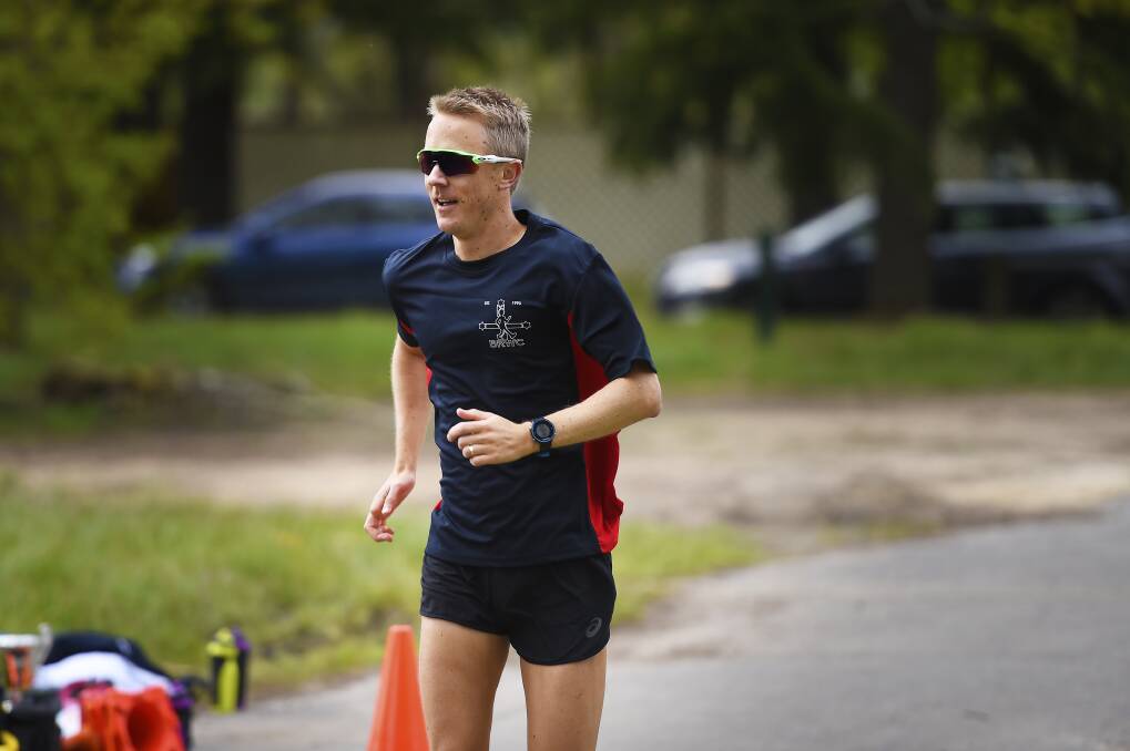 INSPIRING: Olympian Jared Tallent leads by example and steps out with Ballarat Racewalking Club, in club colours, for a junior event late last year. Picture: Luka Kauzlaric
