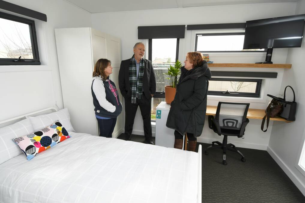 OWN SPACE: Foster carer Maria Baldwin, CAFS chief Allan Joy and Kids Under Cover chief Jo Swift check out the backyard studio in a Ballarat suburb for what will be a first in emergency care. Picture: Lachlan Bence