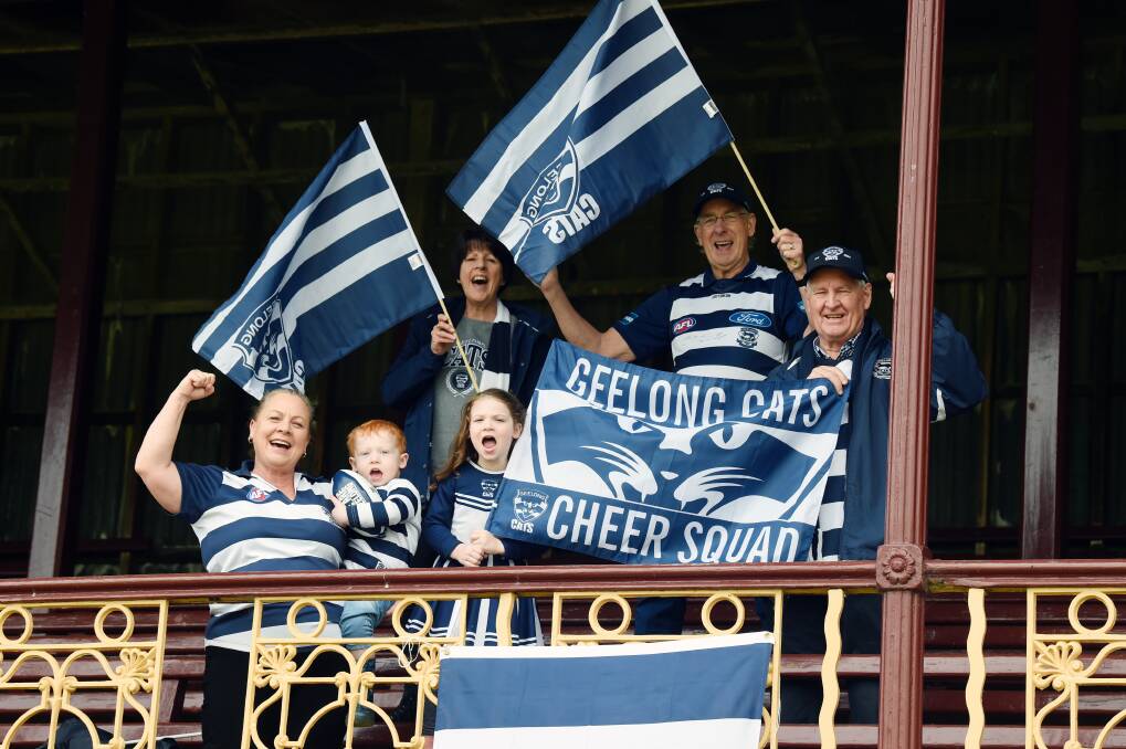 Ballarat Geelong Cats supporters' group members Sharon Buttler, Jimmy Mellington, age two, Pauline Batten, Matilda Mellington, age four, Ross Allen and Brian Buckle get fired up for the AFL grand final. Picture by Kate Healy