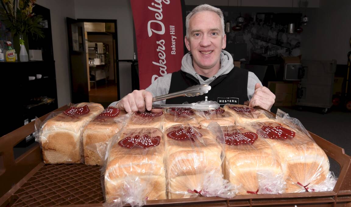 PREPARATION: The Western's Dan Cronin has the bread component ready to bring back the Saturday morning sausage sizzle. Picture: Lachlan Bence