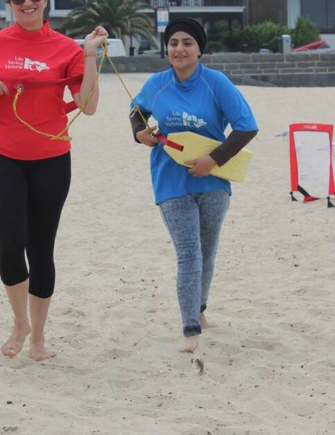 TRAINING: Ghanieh Daghadheleh's first school beach day run. Picture: Life Saving Victoria