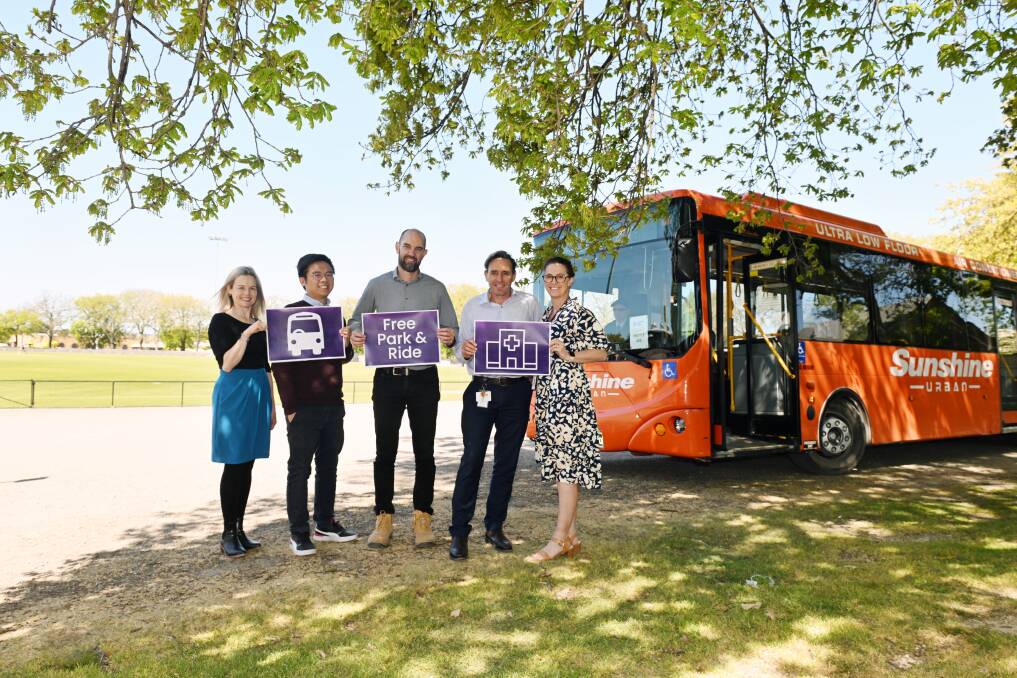 Grampians Health team members Claire Woods (chief people officer), Henry Keung (contract administrator), Mark Powell (redevelopment project manager), Rod Hansen (acting chief executive officer) and Belinda Pickersgill (redevelopment project support officer) promote the park-and-ride service for hospital staff and visitors based at City Oval. Picture by Kate Healy