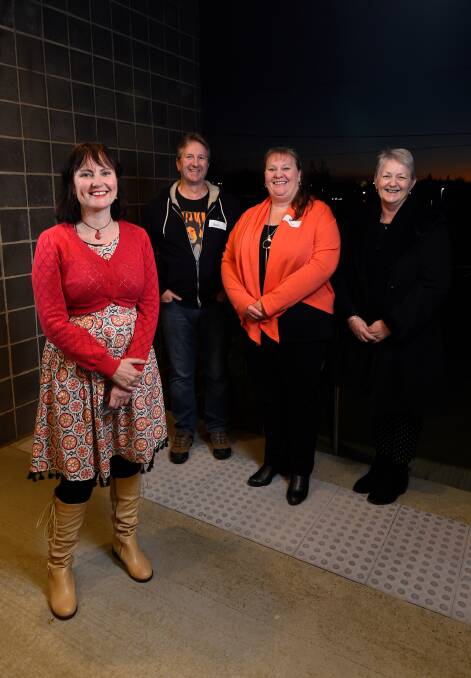 HAPPY SONG: Ballarat's With One Voice choir conductor Suzanne Hobson with participants Steve Wood, Jane De Valle and Barb Clarke. Picture: Adam Trafford