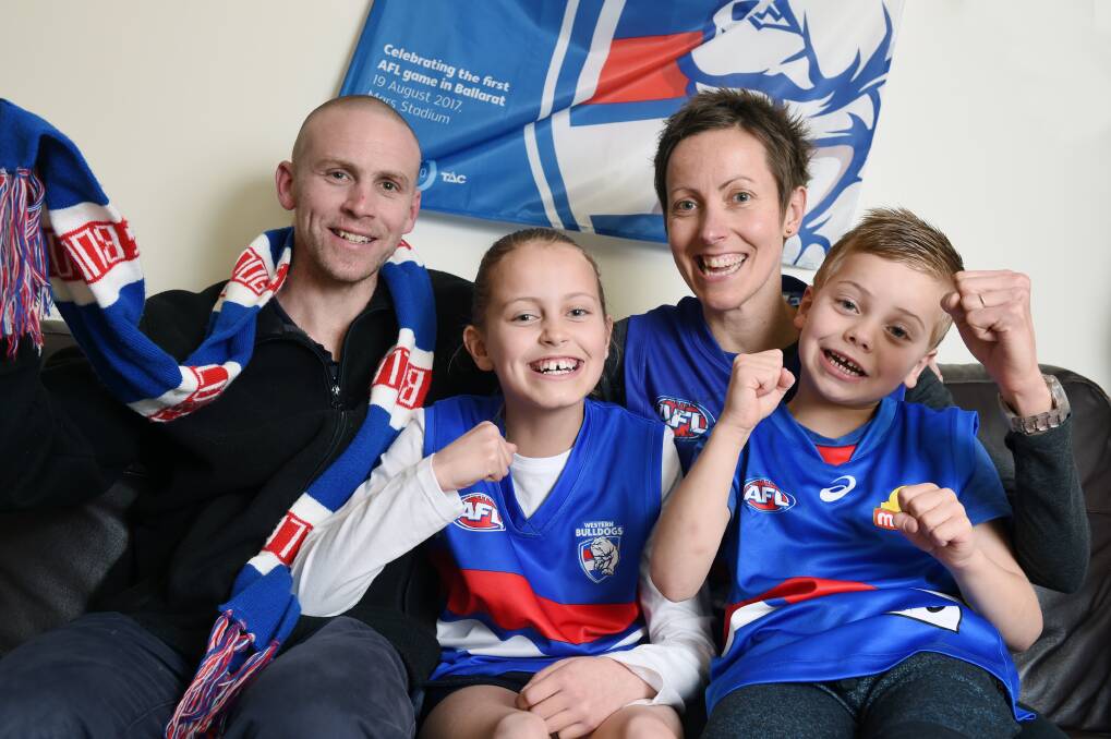 VOCAL: High-profile road trauma survivor Christian Ashby and family Eliza, Karen and Patrick are championing an important TAC message with their beloved Western Bulldogs on Mars. Picture: Kate Healy