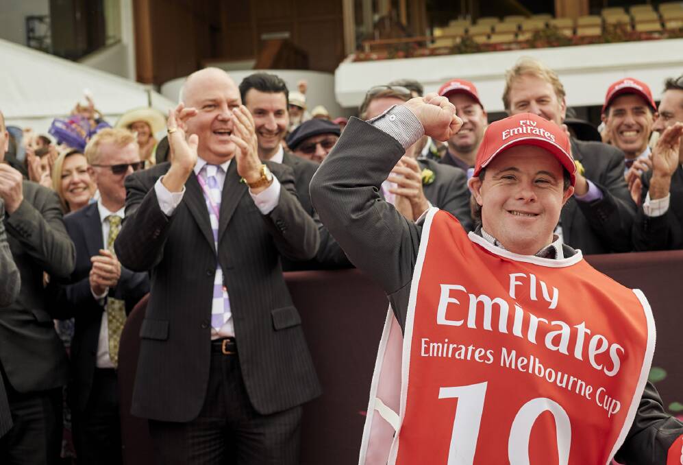MOMENT: Stevie Payne, playing himself, celebrates the 2015 Melbourne Cup win in a still from the film Ride Like A Girl.