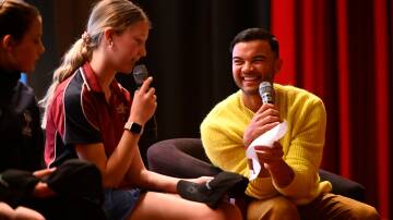 Delacombe pupil Ruby speaks with Guy Sebastian on stage in Hand-in-Hand's event at Regent Cinemas in October 2023, raising money in conjunction with the Sebastian Foundation for The Open Parachute Program, which provides children of all ages tools to pro-actively be able to deal with all issues of mental health. Picture by Adam Trafford