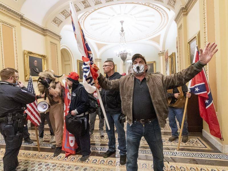 Scenes from the US Capitol building on Thursday (Ballarat time). Picture: AAP