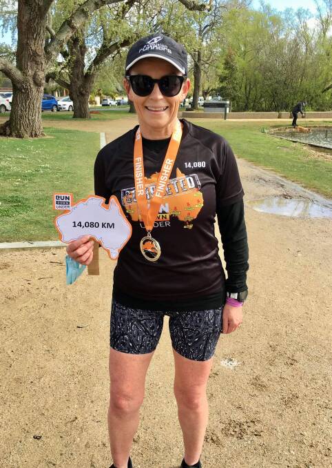 FINISH LINE: Runner Louelle Blanchard clocks up a cumulative 14,080 kilometres' running to complete a lap of Australia in Run Down Under. Blanchard chose to finish with a lap of Lake Wendouree. Picture: courtesy Louelle Blanchard