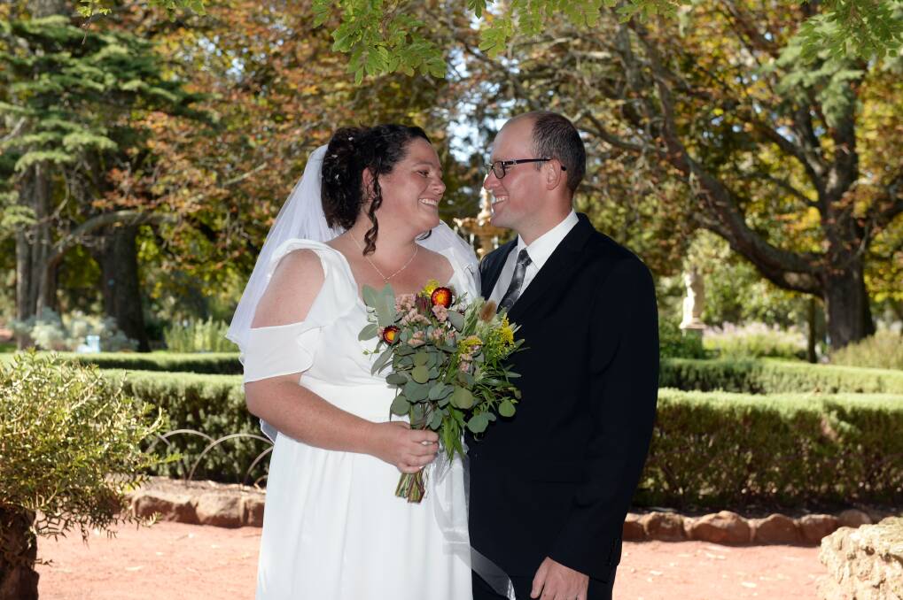 TOGETHER: Samantha Mennen (née Smith) and Tom Mennen got married Saturday in case they could not get married at all on the Easter weekend like they had planned. Picture: Kate Healy