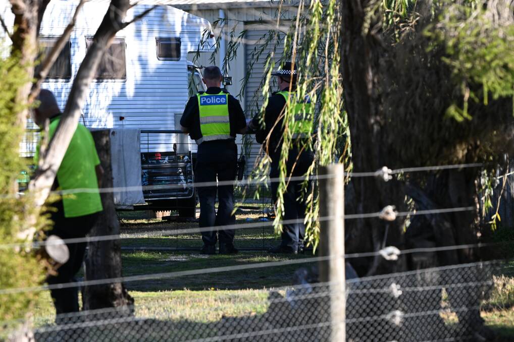 Police investigating the scene in which a Waubra man has died while working alone in his backyard. Picture by Lachlan Bence