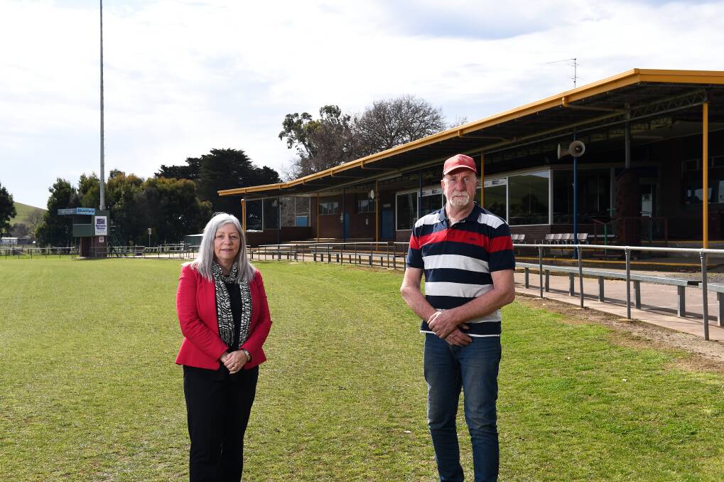 UNITY: Bendigo Bank regional manager Leanne Martin and Central Highlands Football League president Doug Hobson encourage everyone to pick up the phone and call a mate in what should be footy finals time. Picture: Adam Trafford