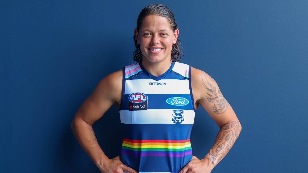 BRIGHT NOTE: Richelle "Rocky" Cranston shows off Geelong Cats' AFLW pride round jumper she helped to design. Picture: Geelong Cats
