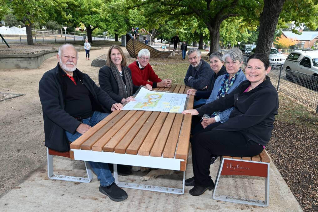 Wolf Beter (Creswick Mens Friendship Shed), Ballarat MP Catherine King, Hepburn Shire councillors Don Henderson and Tim Drylie, Lisa Dawes (Norman Lindsay Magic Pudding Playground Working Group), Fairlee Lincoln (Norman Lindsay Magic Pudding Playground Working Group) and Chrissy Austin (Creswick Neighbourhood House) at the playground's new picnic tables to help more families enjoy the space. Picture by Kate Healy
