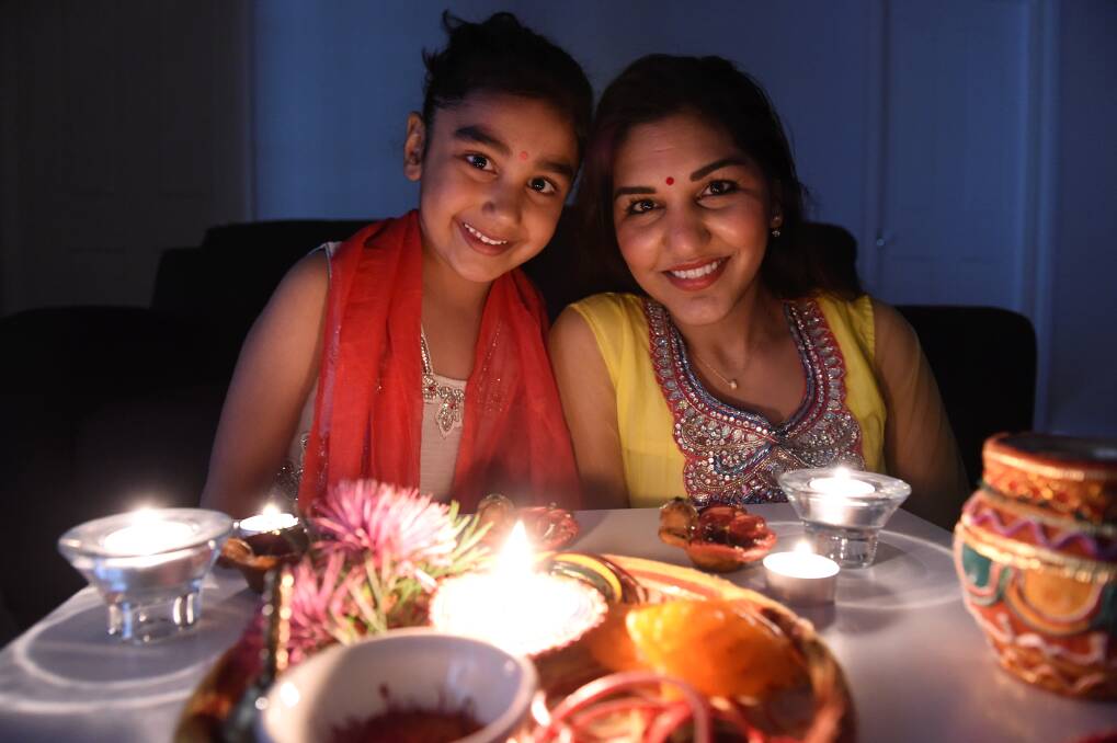 CELEBRATE: Five-year-old Saachi with her mum Sheetal Mehta prepare to share the Indian Diwali festival with Ballarat. Picture: Lachlan Bence