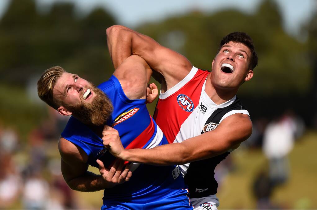TUSSLE: Western Bulldog Jackson Trengove battles Saint and former Greater Western Victoria Rebel Rowan Marshall in a 2019 AFL pre-season bout. Picture: Adam Trafford.