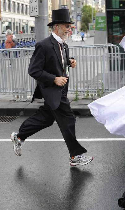 STATEMENT PIECE: Ballarat refugee advocate David MacPhail takes part in the Melbourne Marathon.