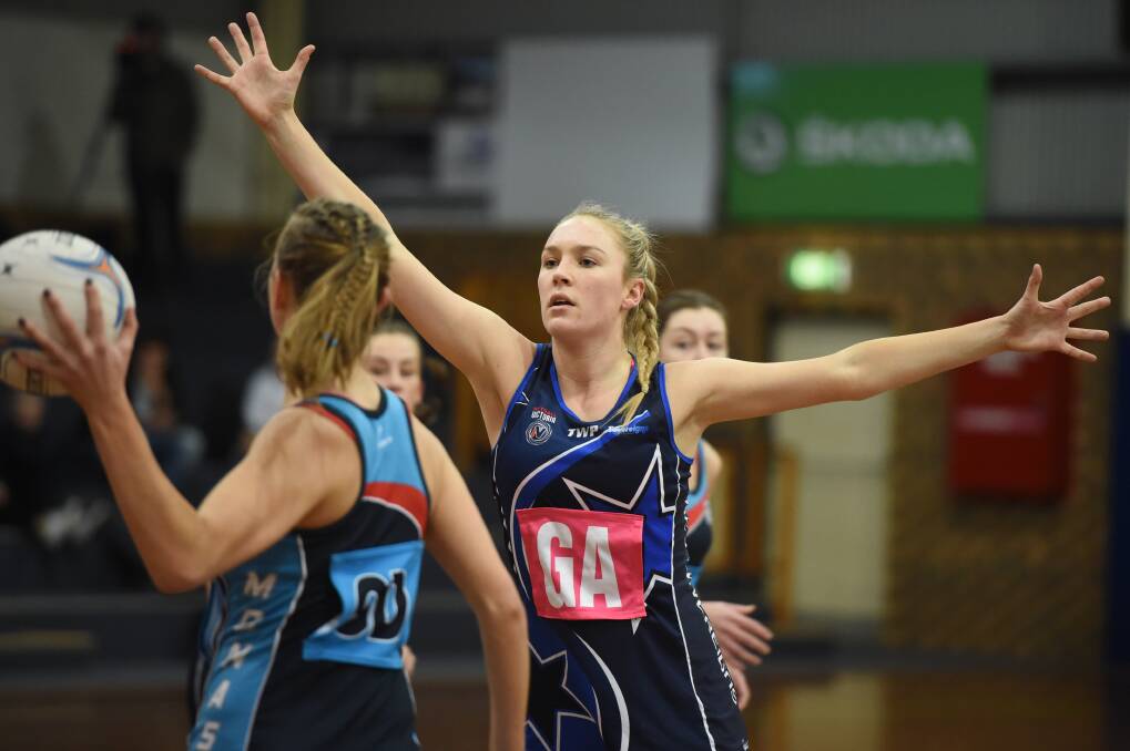 STRETCHING: Ballarat netballer Sacha McDonald will get her first taste of Super Netball travelling with Melbourne Vixens for pre-season tournament. Her brothers play AFL with Melbourne. Picture: Kate Healy