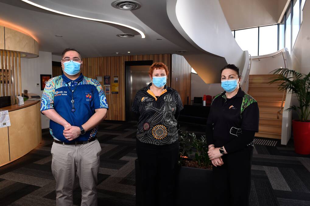 UNITY: Ballarat and District Aboriginal Cooperative practice manager Paul Kiohskamper, general practitioner Bec Quake and nurse immuniser Lisa Timmins call on Indigenous people to get vaccinated. Picture: Adam Trafford