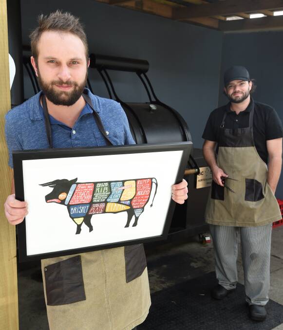 COOK UP: Holy Smokes chefs Ben Kulman and Caleb Burchett want you to taste what they are all about in Carnivore Feast this Saturday - just follow the smoke. Picture: Lachlan Bence
