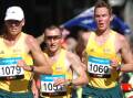PROUD: Ballarat's Shane Nankervis, far right, runs in the green-and-gold along Flinders Street in the 2006 Melbourne Commonwealth Games. Picture: Lachlan Bence