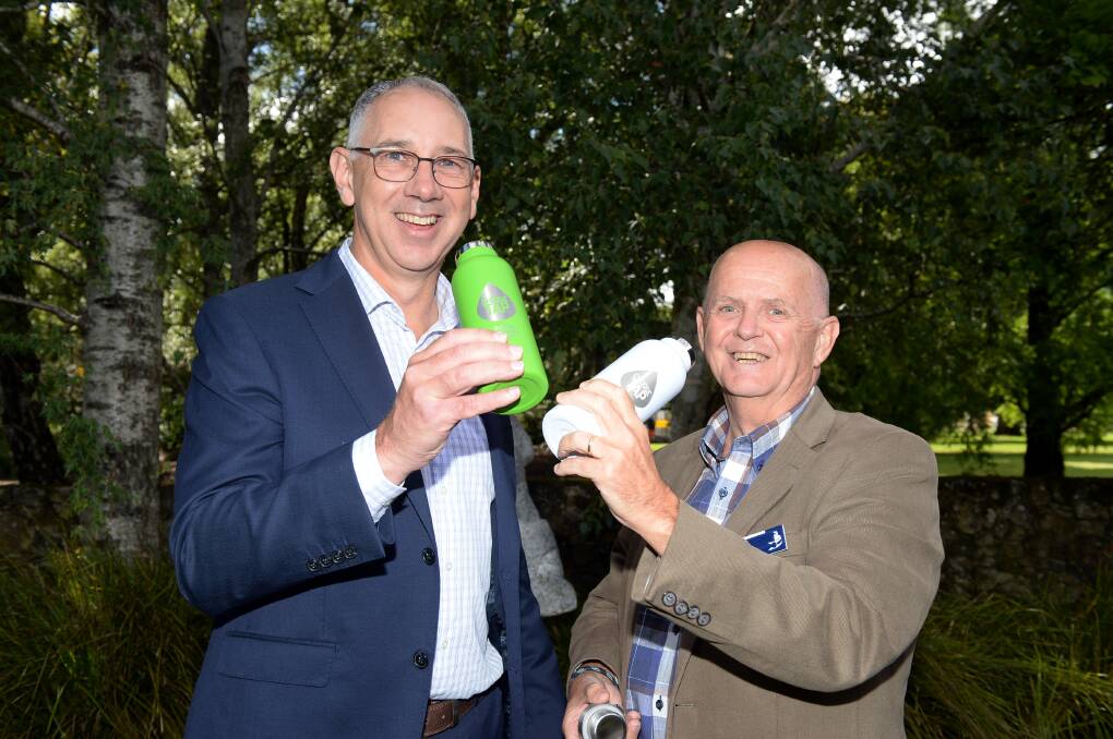 You can always find a good drink bottle at the Ballarat Bgonia Festival from Central Highlands Water with the water board's managing director Jeff Haydon and City of Ballarat deputy mayor Peter Eddy quenching their thirst ahead of the festival. Picture by Kate Healy