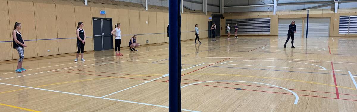 FINE-TUNING: WestVic Academy of Sport netball head coach Kate McMahon leads players through an on-court session before lockdowns. Picture: WestVic Academy of Sport