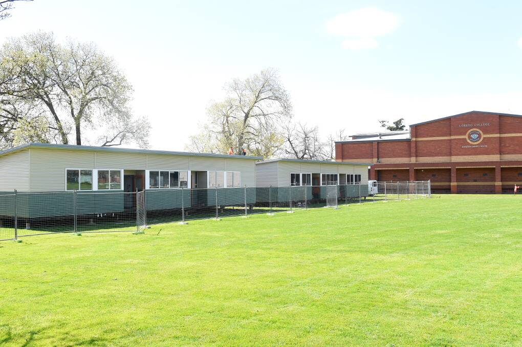 Portable classrooms have been set up on the Loreto College oval as part of ongoing supports for students recovering from the horrific bus crash during the school holidays. Picture by Adam Trafford