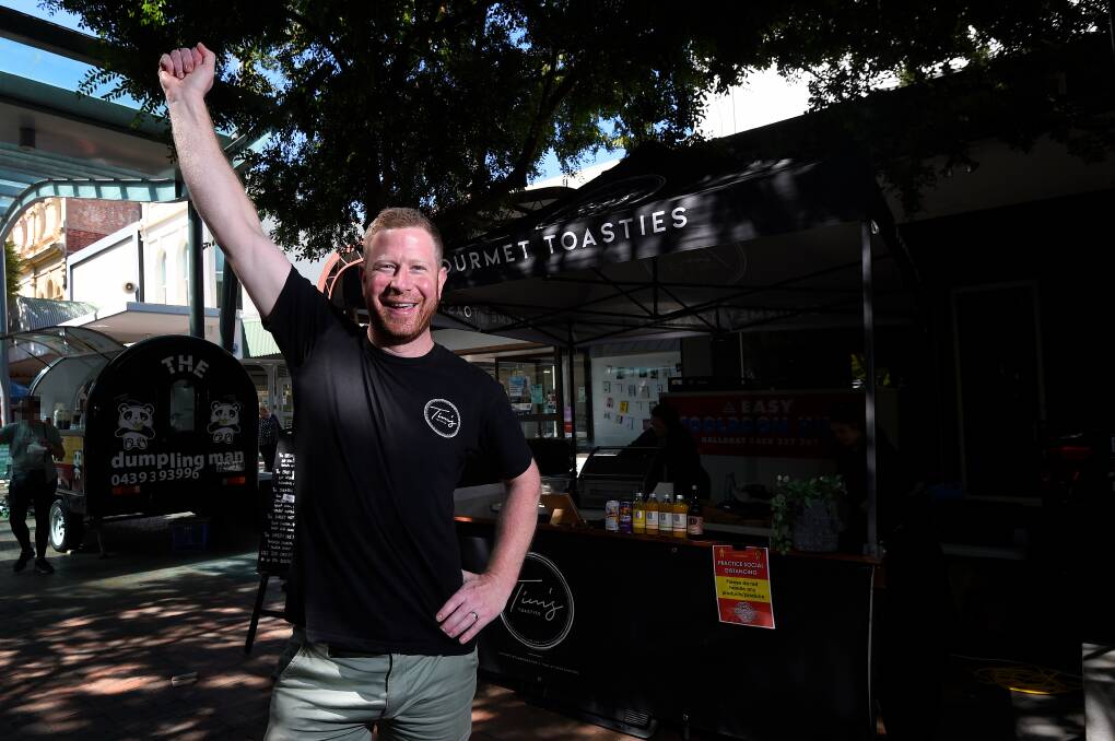 STAYIN' ALIVE: Toastie guru and MasterChef contender Tim Bone fires up his dance moves at Bridge Mall Farmers Market to jive away for charity and say thanks to all the support Ballarat has shown him. Picture: Adam Trafford