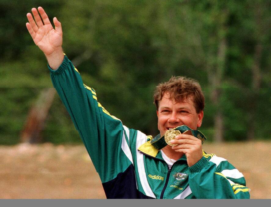 GOLDEN: Russell Mark celebrates hi Olympic gold medal for the men's double trap at the 1996 Atlanta Games. Picture: AAP