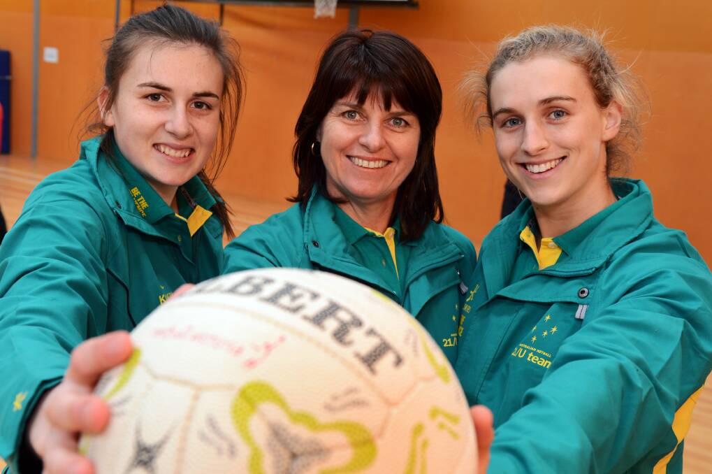 GOLDEN: Australia 21/under netball captain Maddy Proud, coach Carol Byers and vice-captain Gabi Simpson ahead of the international series in 2012. Picture: Kate Healy